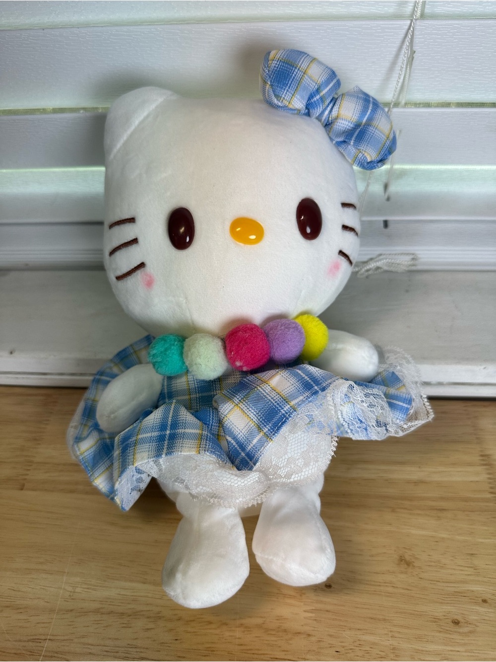 Hello Kitty White Plush in Blue Plaid Dress with Multicolor Pom-Pom Necklace